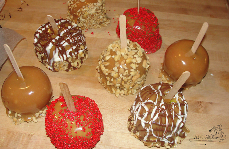 caramel dipped apples with sprinkles and nuts