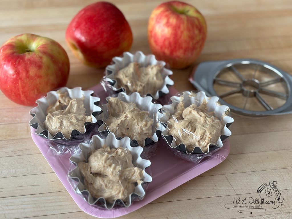 Apples with sauce in containers